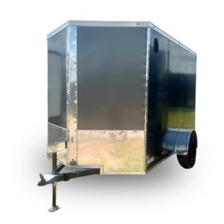 Black enclosed cargo trailer with chrome diamond-plate trim, hitch and single axle on gravel surface (outdoors).