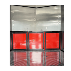 A red and black trailer with two doors.