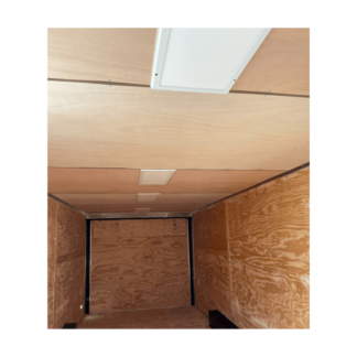 The inside of an enclosed Raw Luan on Ceiling cargo trailer.