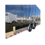 A silver enclosed trailer on a white background.