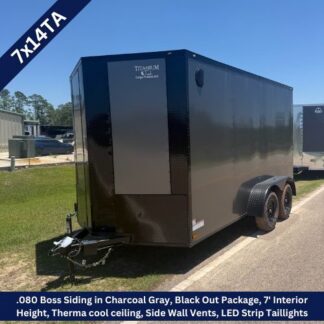 Black 7x14TA enclosed cargo trailer with dual axles, parked on a street. Front hitch and diamond-plate accents visible.