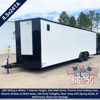 White 8.5x24TA enclosed tandem-axle cargo trailer on a dealership lot under a blue sky.