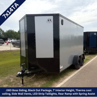 7x14TA enclosed cargo trailer in black and gray with dual axles and a front hitch on a parking lot