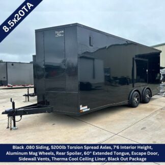 Black enclosed trailer, 8.5x20, dual 5200 lb torsion axles, extended tongue and escape door on a concrete lot.