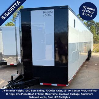 Titanium Cargo 8.5×36 White Triple Axle Enclosed Cargo Trailer with Blackout and Etrac ‣ Boss Cargo Trailers 8.5×36-foot dual-axle enclosed cargo trailer with black front and white sides, hitch at the front, Titanium Cargo Trailers LLC branding visible on the door.